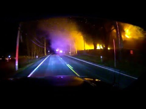 Deshcam footage: Emergency Vehicle Arriving At Fire In Camp Gila In Upstate New York