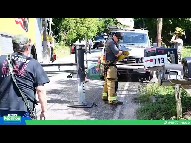 The Monroe Fire Department responded to the scene on Cromwell Road after a worker became trapped