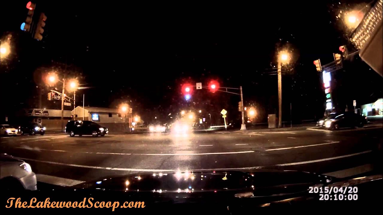 Driver Leisurely Drives Through Red Light