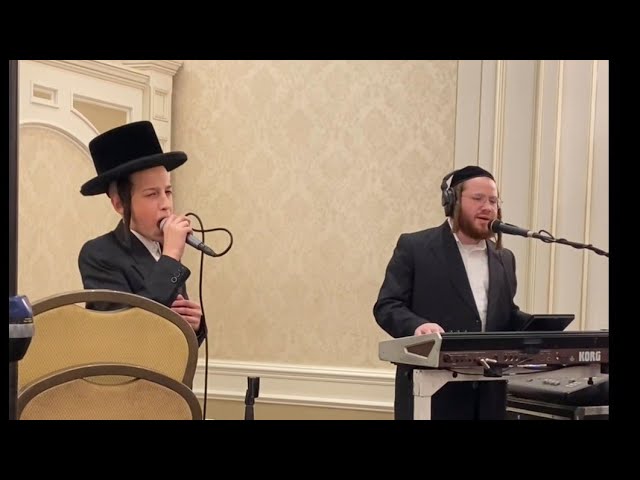 Former Child Soloist Dovi Barchoirin Singing At An Event With Avromi Berko