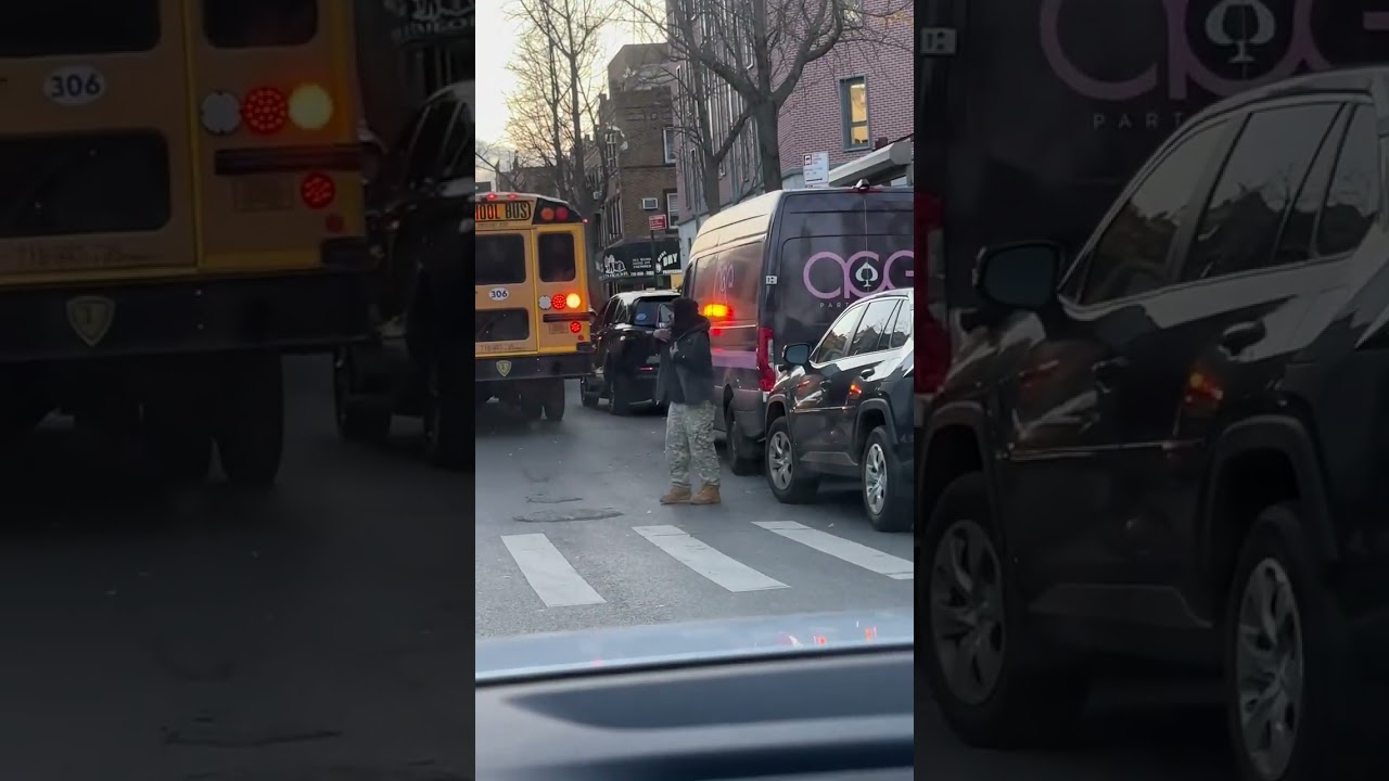 A car pushing a truck in Boro Park😆