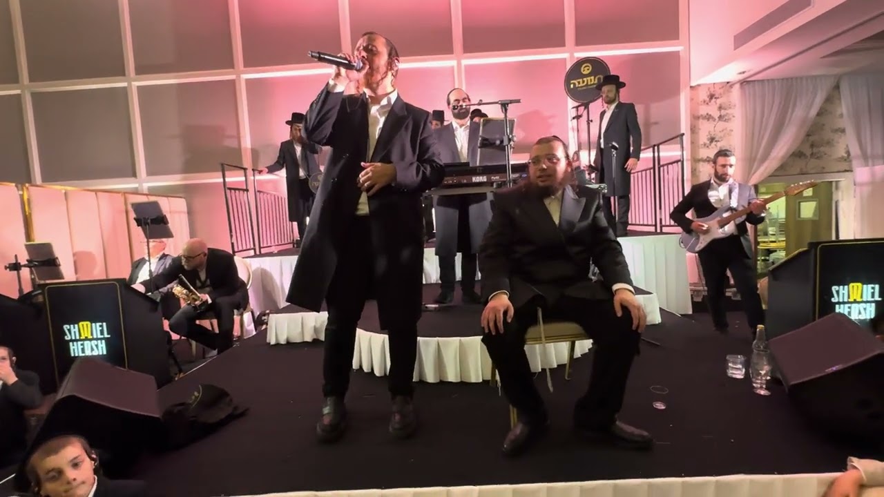 Shimel Hirsh Miller on the keys & Sruly green @ Weiss & Baundo