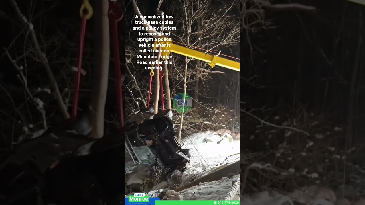 Tow Truck Uses Cables & A Pulley System To Recover & Upright A Police Car
