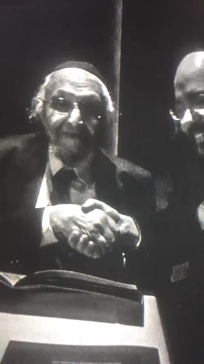“Rare Footage: Rabbi Feinstein’s Blessing for the Ashlag Rebbe.”